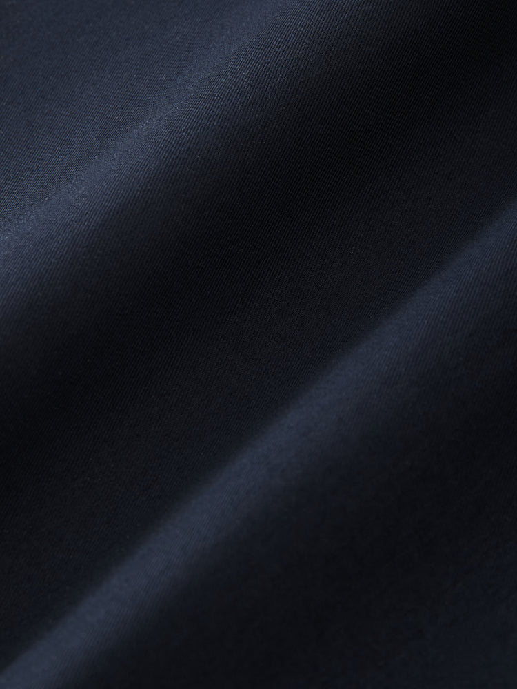 CROWE COATED COTTON COAT IN DARKEST NAVY